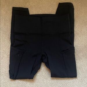 Athleta Black High-Rise Performance Leggings with Side Pockets